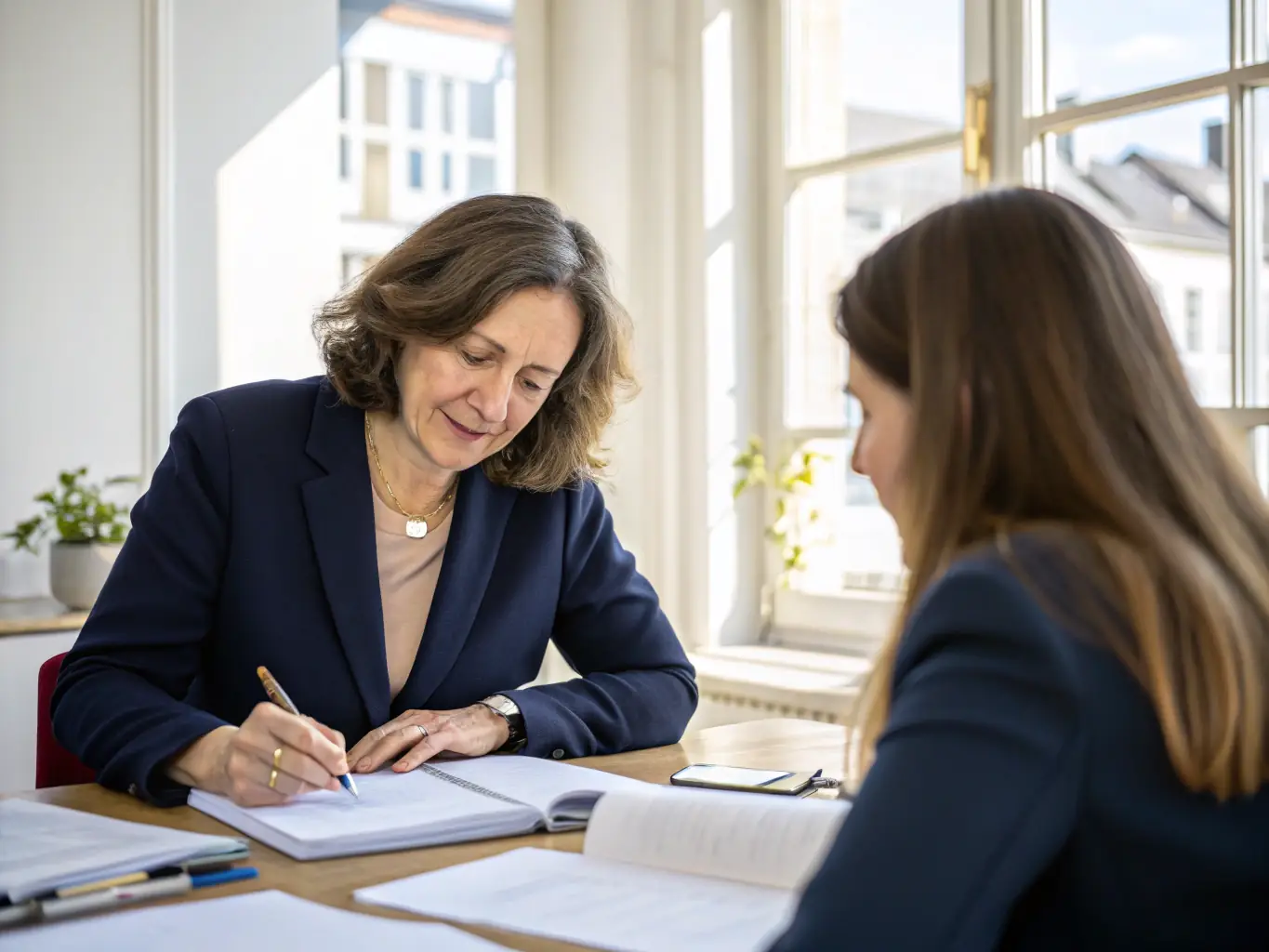 A professional real estate agent explaining the terms and conditions of a sale deposit agreement to a client in a modern office setting, emphasizing clarity and trust.